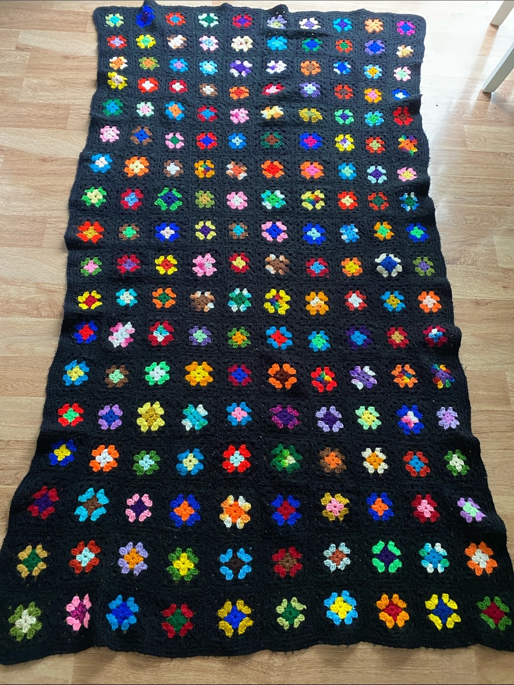 Handmade Black Granny Square Crochet Blanket with Multicolor Flowers flawed